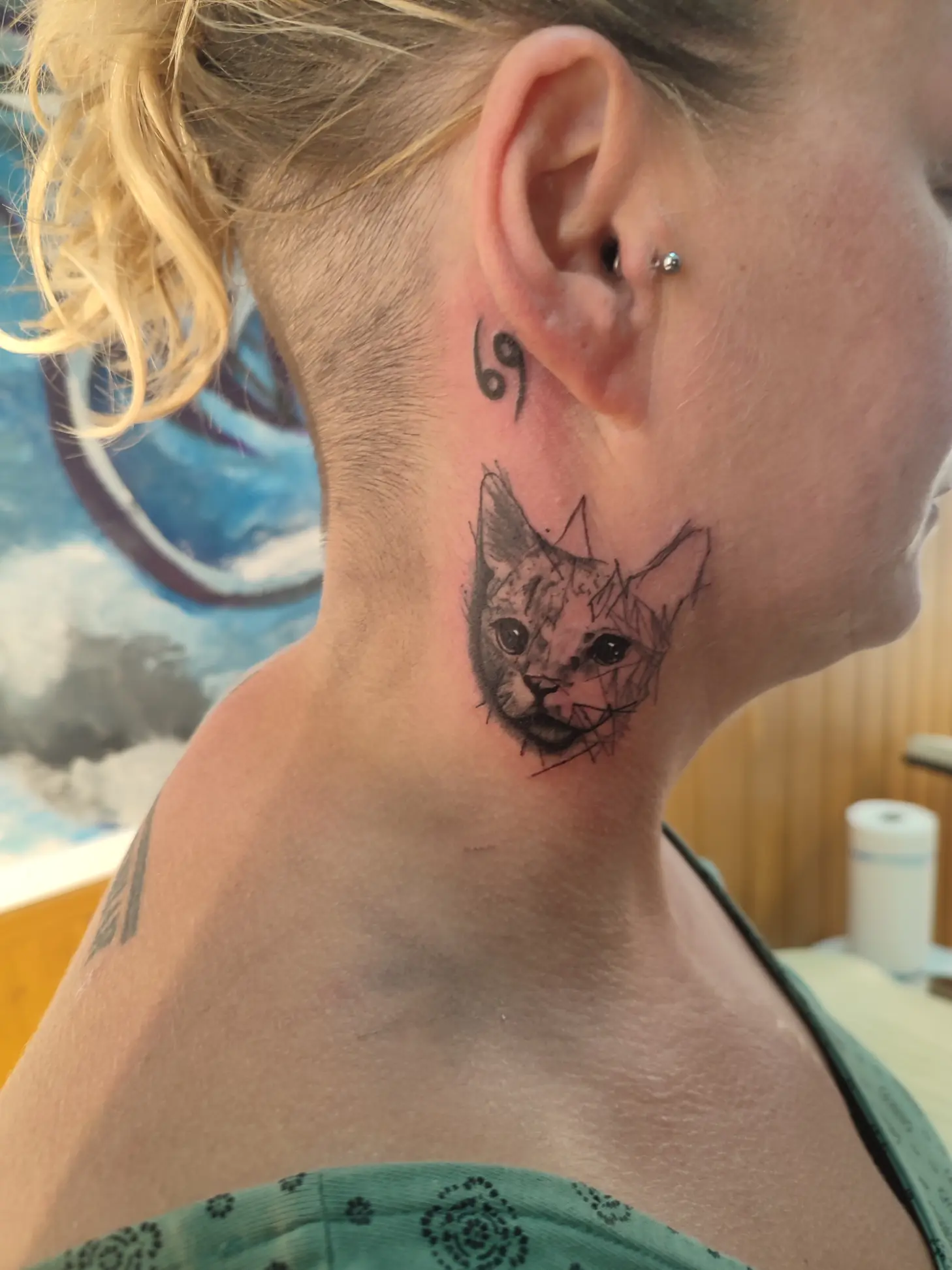 Fine line tattoo placement on the arm during a vacation tattoo session