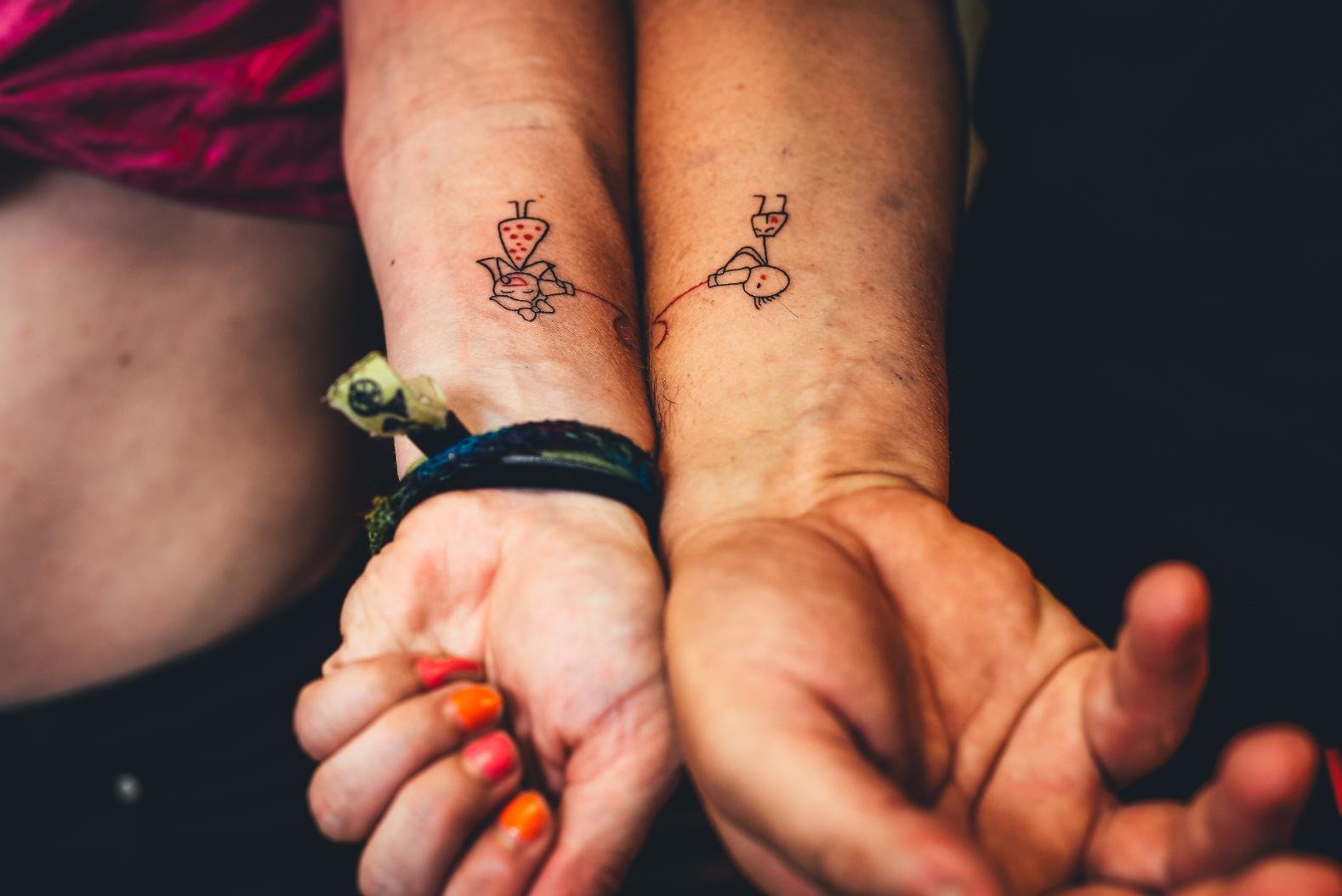 Matching minimalist tattoo for couples